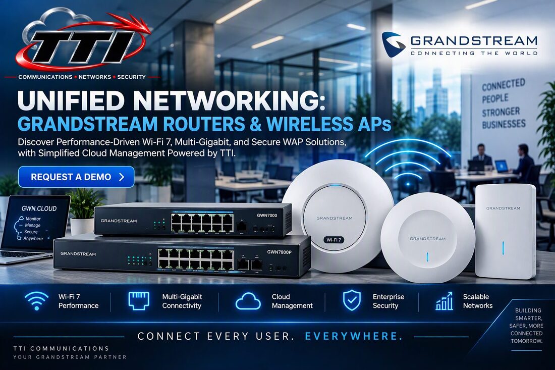 Grandstream network switches and Wi-Fi access points on an office desk with cloud management on a laptop